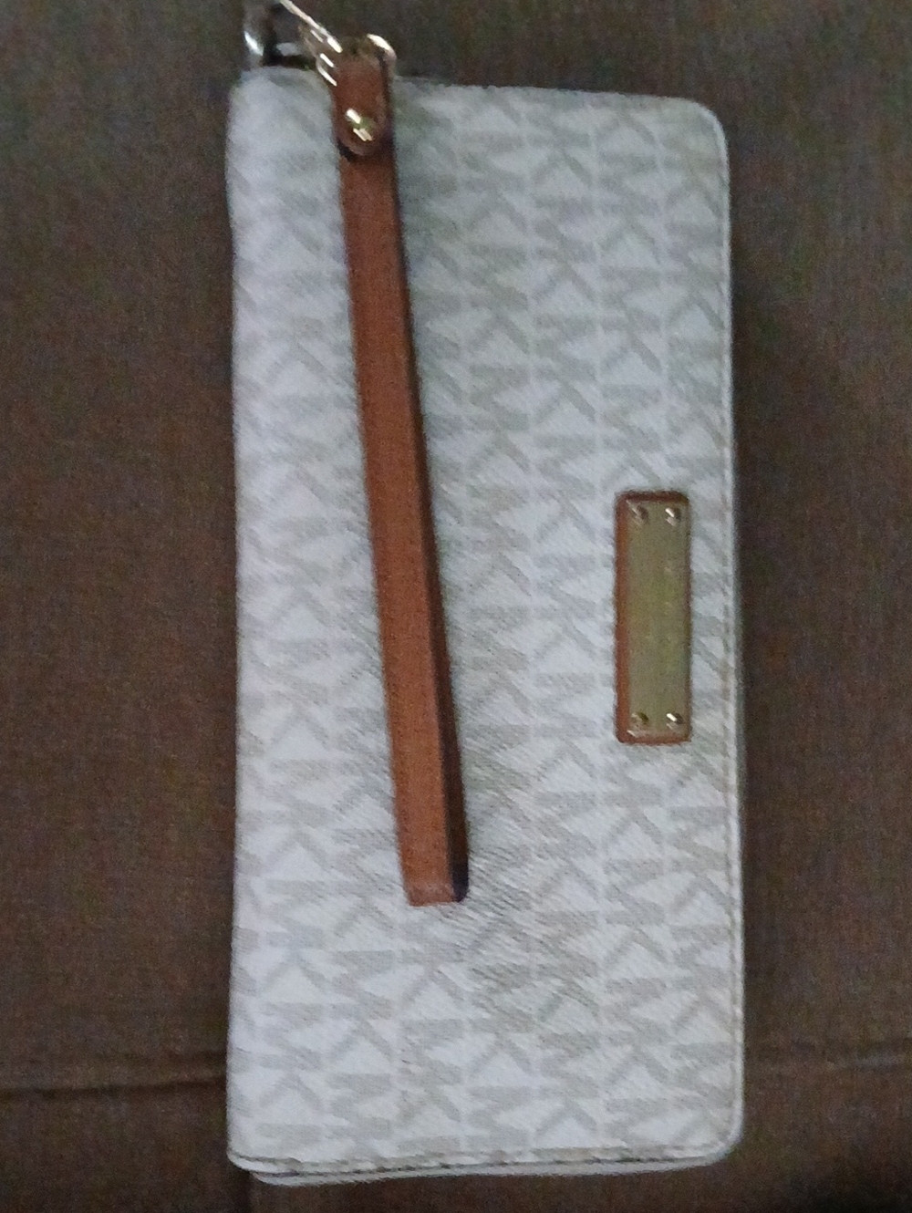 Michael Kors Cream Monogram Wristlet with Brown Strap
